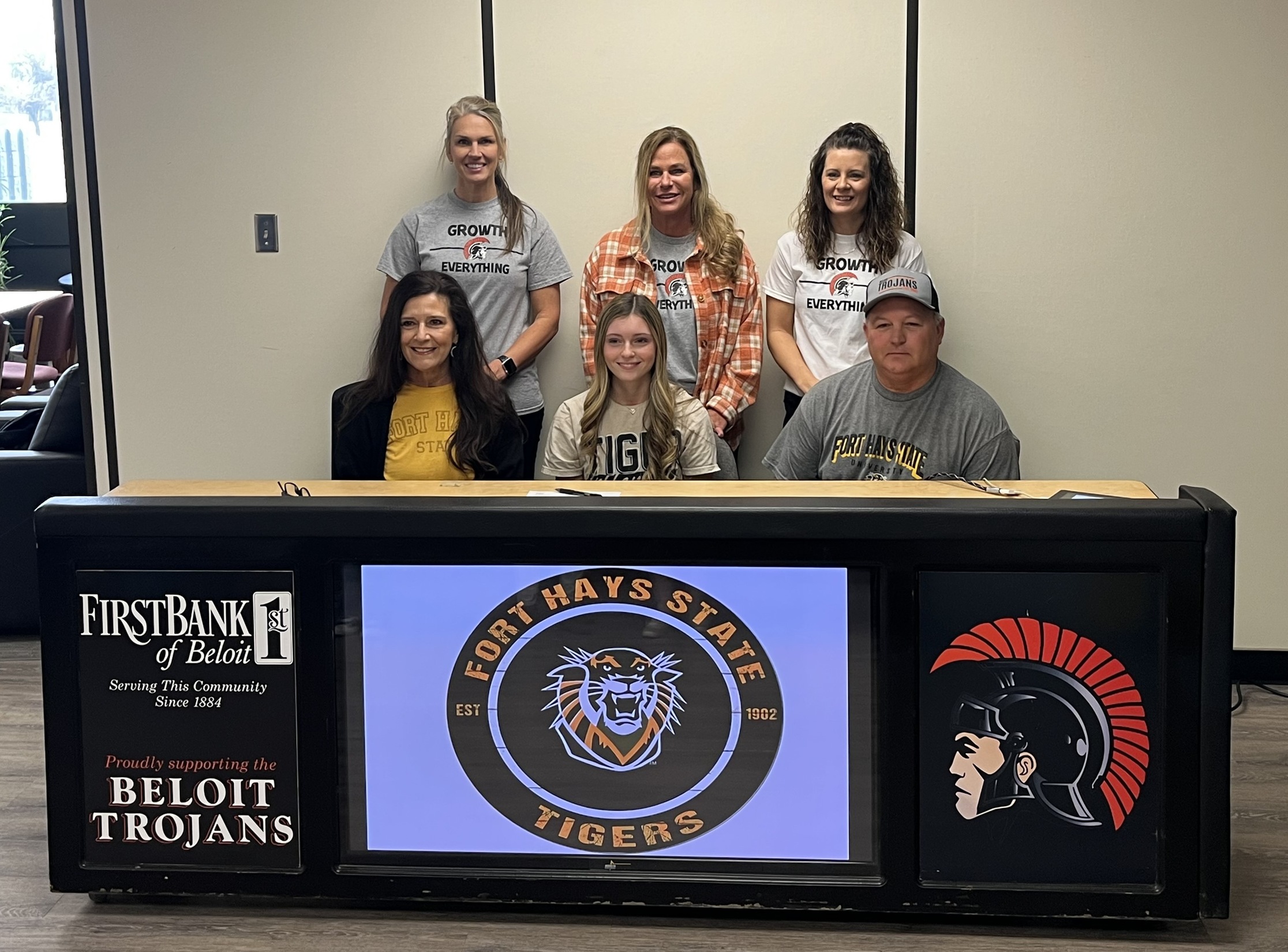 Pictured: Front row (L to R): Melissa Brown (Mom), Mylie Brown, Jerry Brown (Dad); Back row (L to R): Assistant Coach Stephanie Litton, Head Coach Brandy Paul, Assistant Coach Josie Burke.

(Photo courtesy Beloit AD Kyle Beisner)