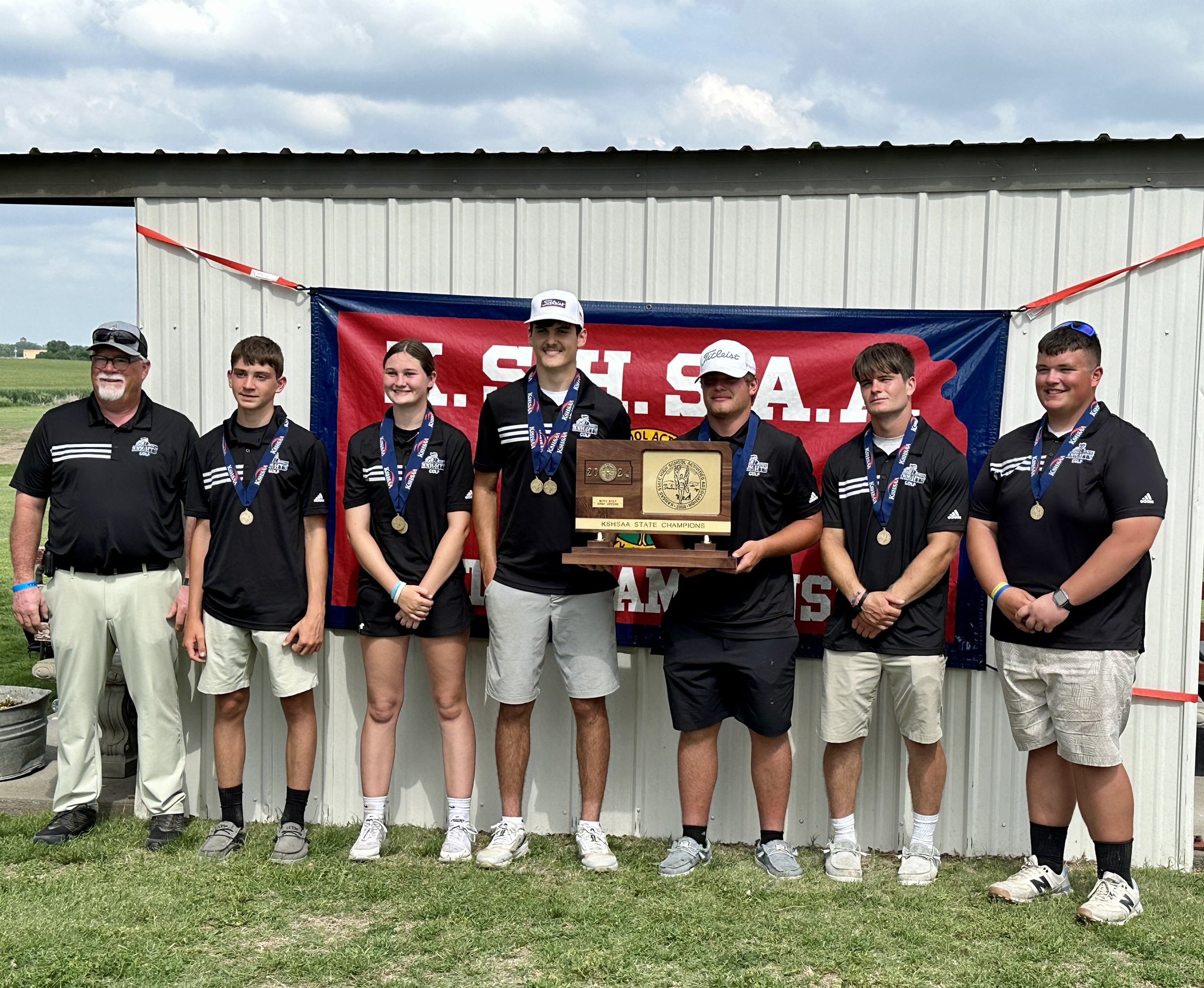 Pictured L to R: Coach Cory Beougher, Eli Schmitt, Tatum Miller, Jace Cunningham, Gabe Smith, Ian Kresin and Jackson Hardy (Photo courtesy @lakesideknights on X)